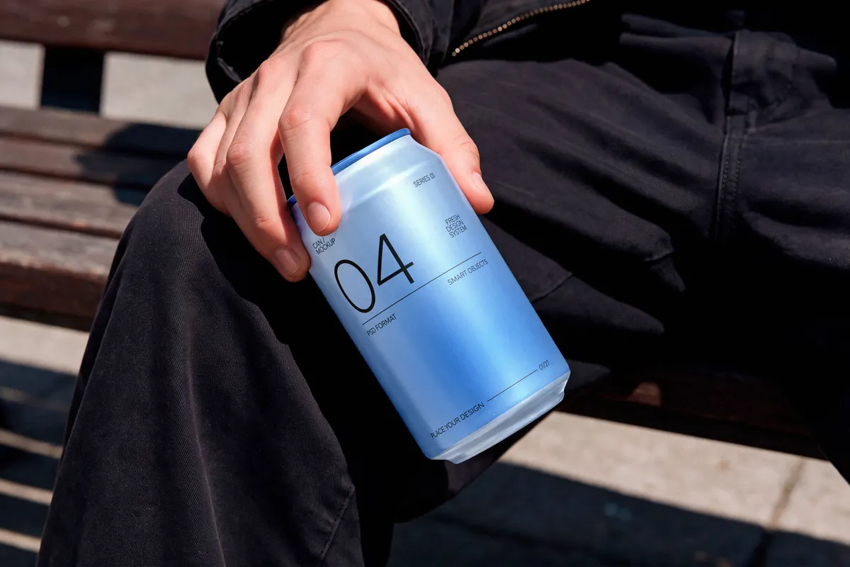 Soda Can in Hand Mockup