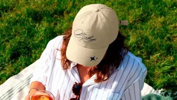 Cap Mockup on Model at Picnic