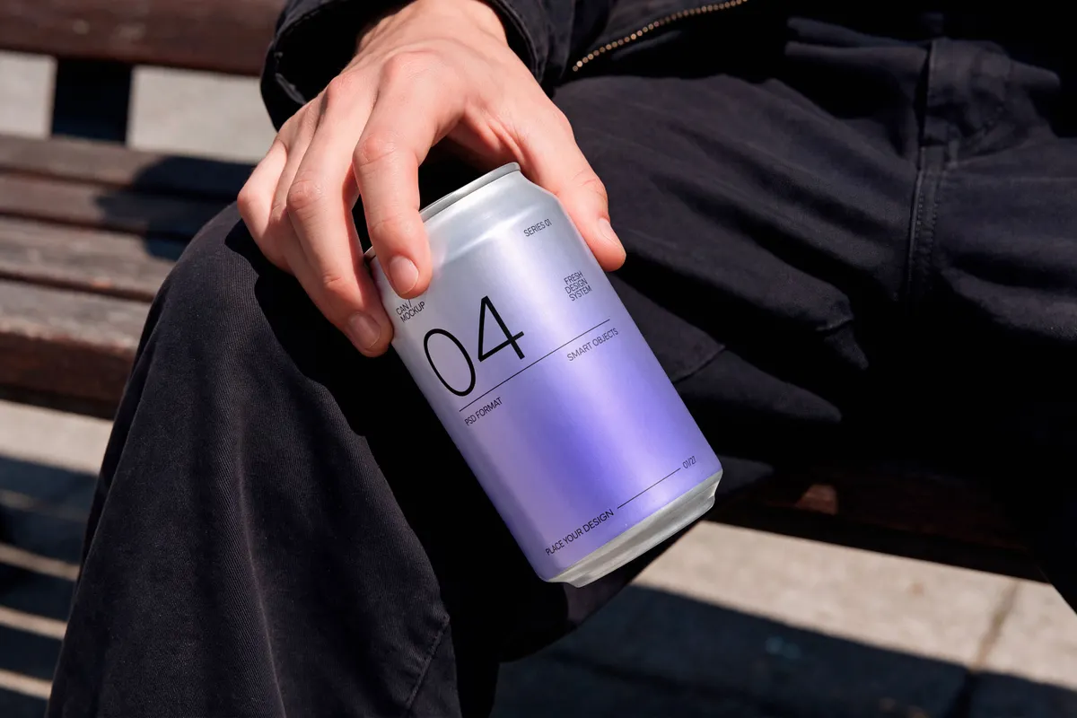 Soda Can in Hand Mockup