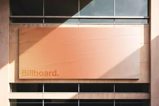 Glued Building Billboard Mockup