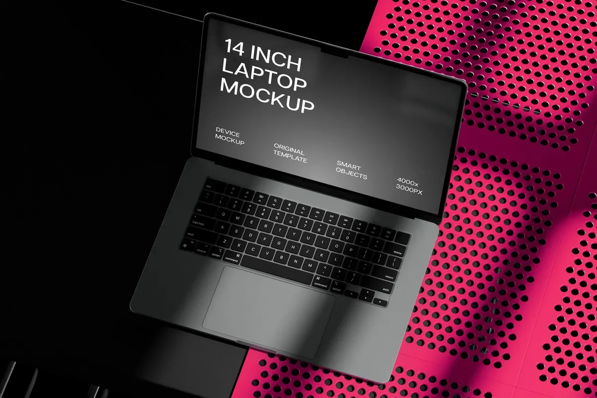 Low-Angle MacBook Pro 14 on Yellow Table