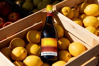 Wine Bottle Mockup on a Fruit Stall