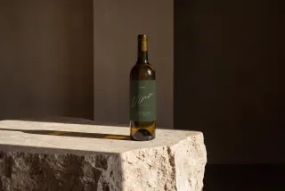 Stone Pedestal Wine Bottle Mockup