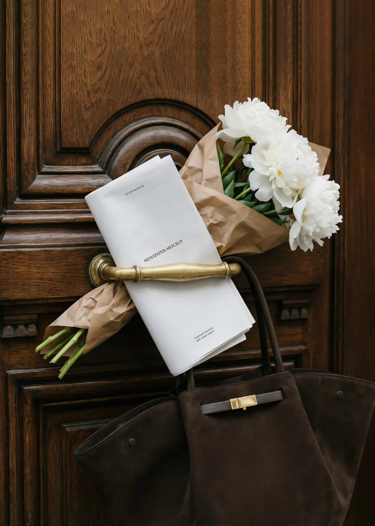 X1955 - Folded Newspaper Mockup in a Door Handle