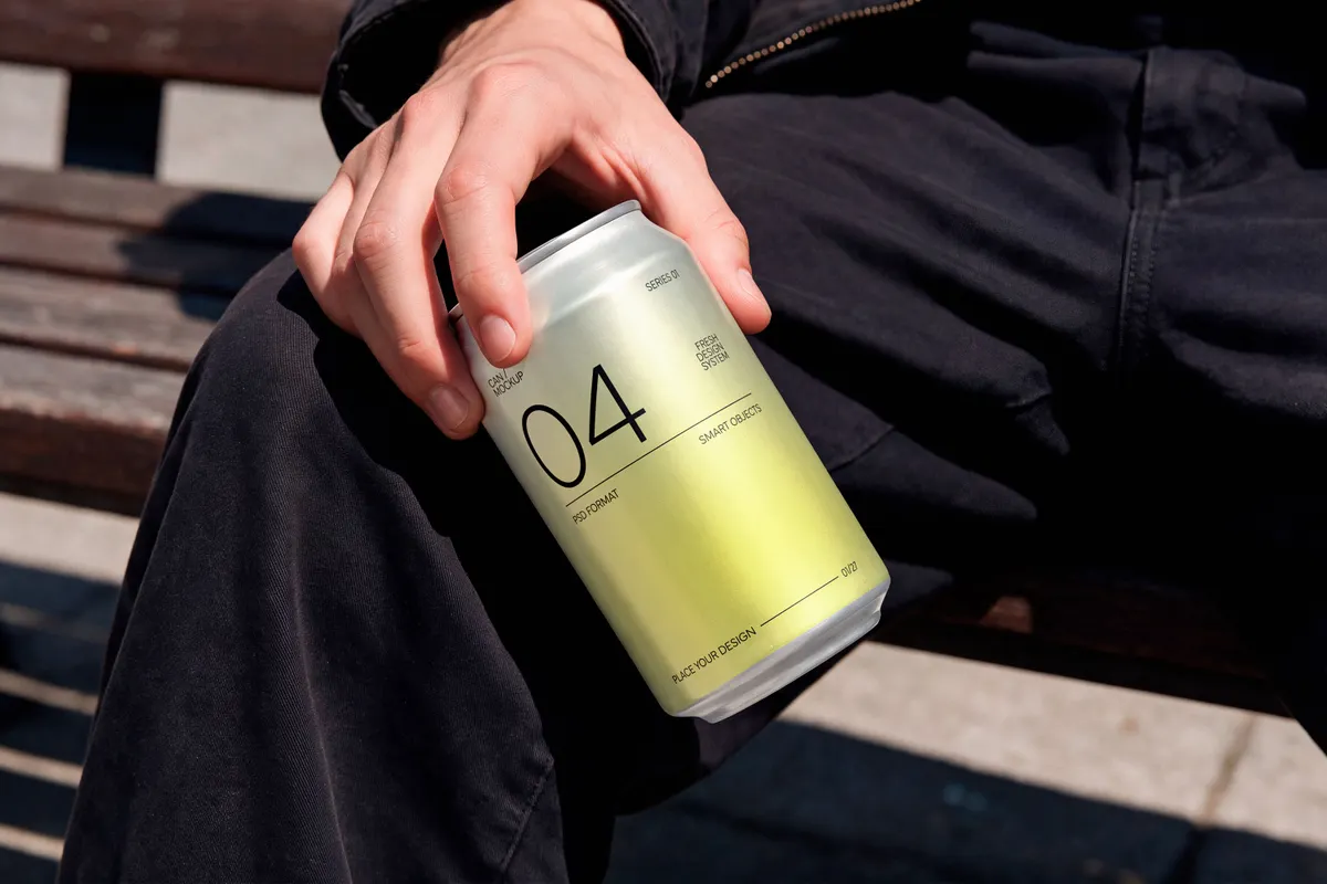 Soda Can in Hand Mockup