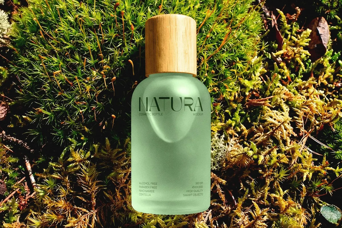 Frosted Cosmetic Bottle Mockup in Moss