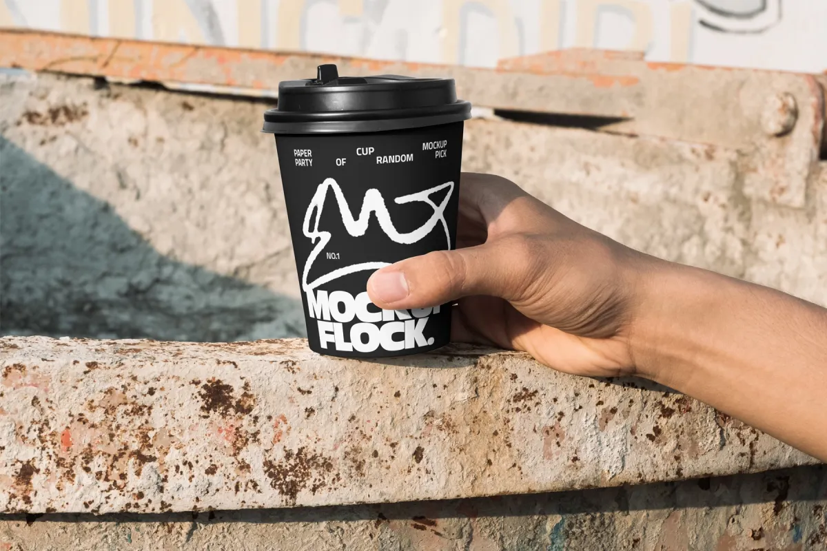 Hand-Held Coffee Cup Mockup