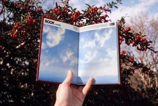 Open Book Mockup in Hand