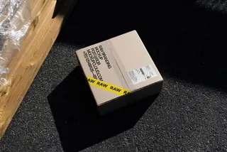 RAW Cardboard Box Mockup on Asphalt