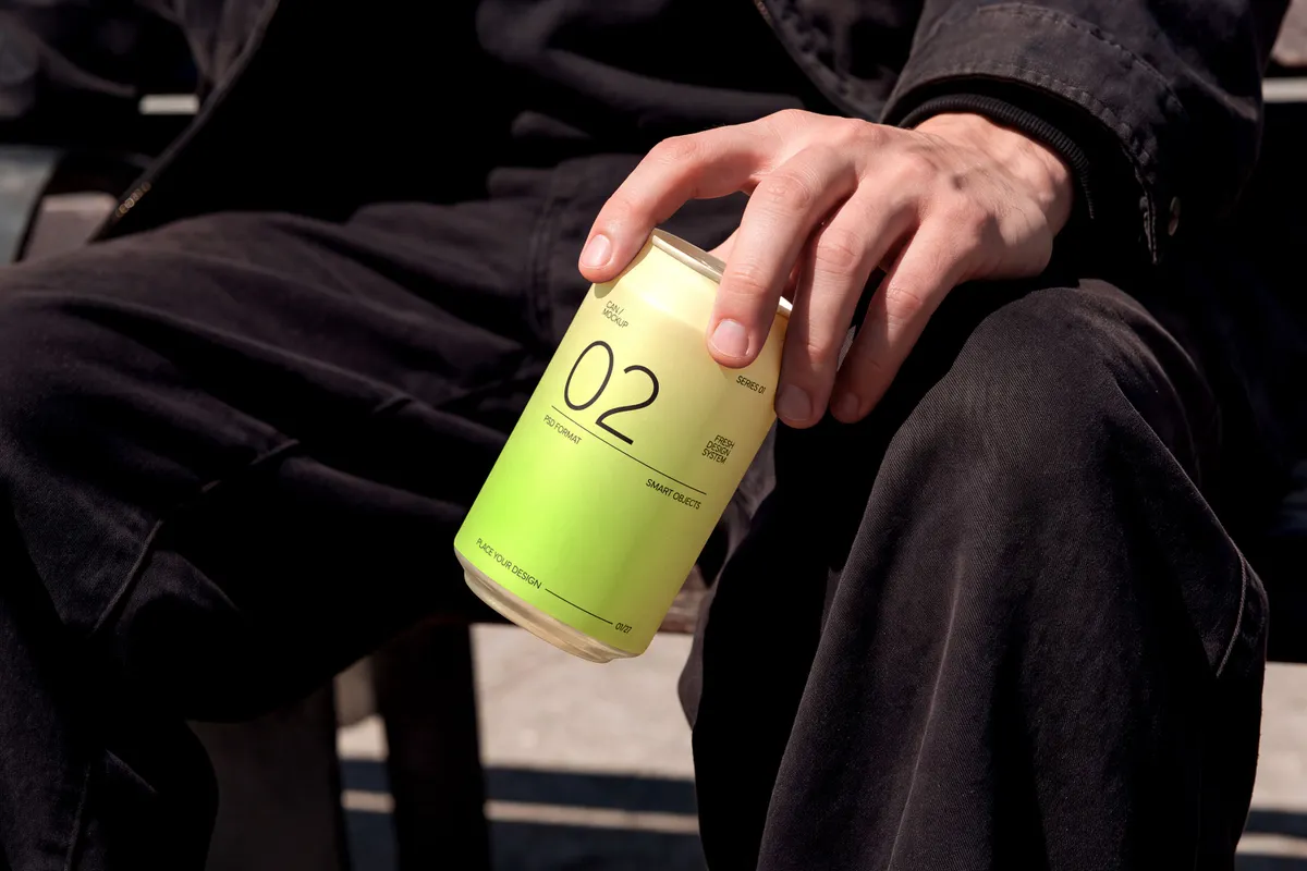 Aluminum Can in Hand Mockup