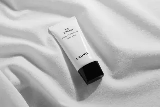 Skincare Tube Mockup on Fabric