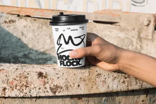 Hand-Held Coffee Cup Mockup