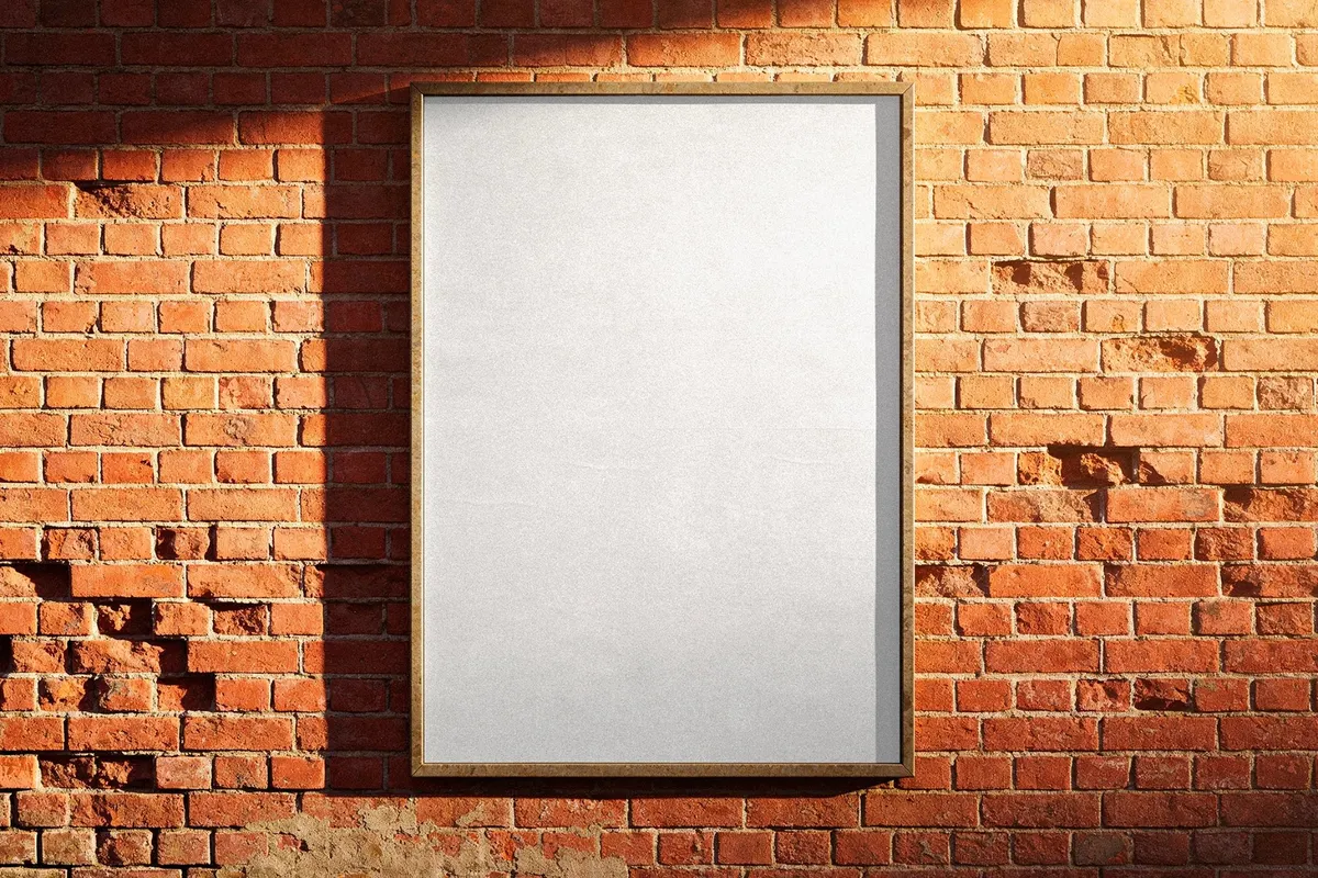 Framed Poster Mockup on Brick Wall