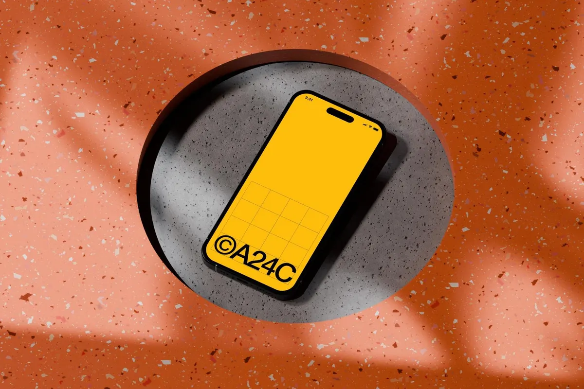 iPhone 16 Mockup on Concrete