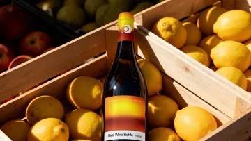 Wine Bottle Mockup on a Fruit Stall
