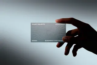 Business Card in Hand Mockup