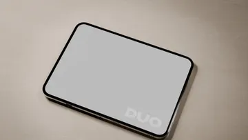 Unfolded iPhone Duo on Travertine Mockup