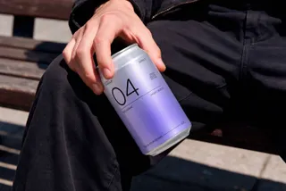 Soda Can in Hand Mockup