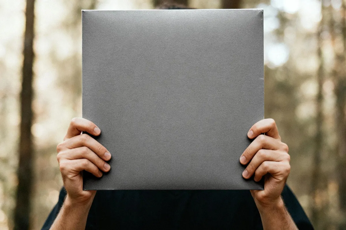 Handheld Vinyl Record Cover Mockup