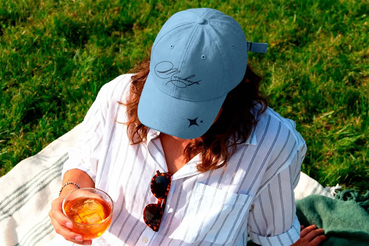 Cap Mockup on Model at Picnic